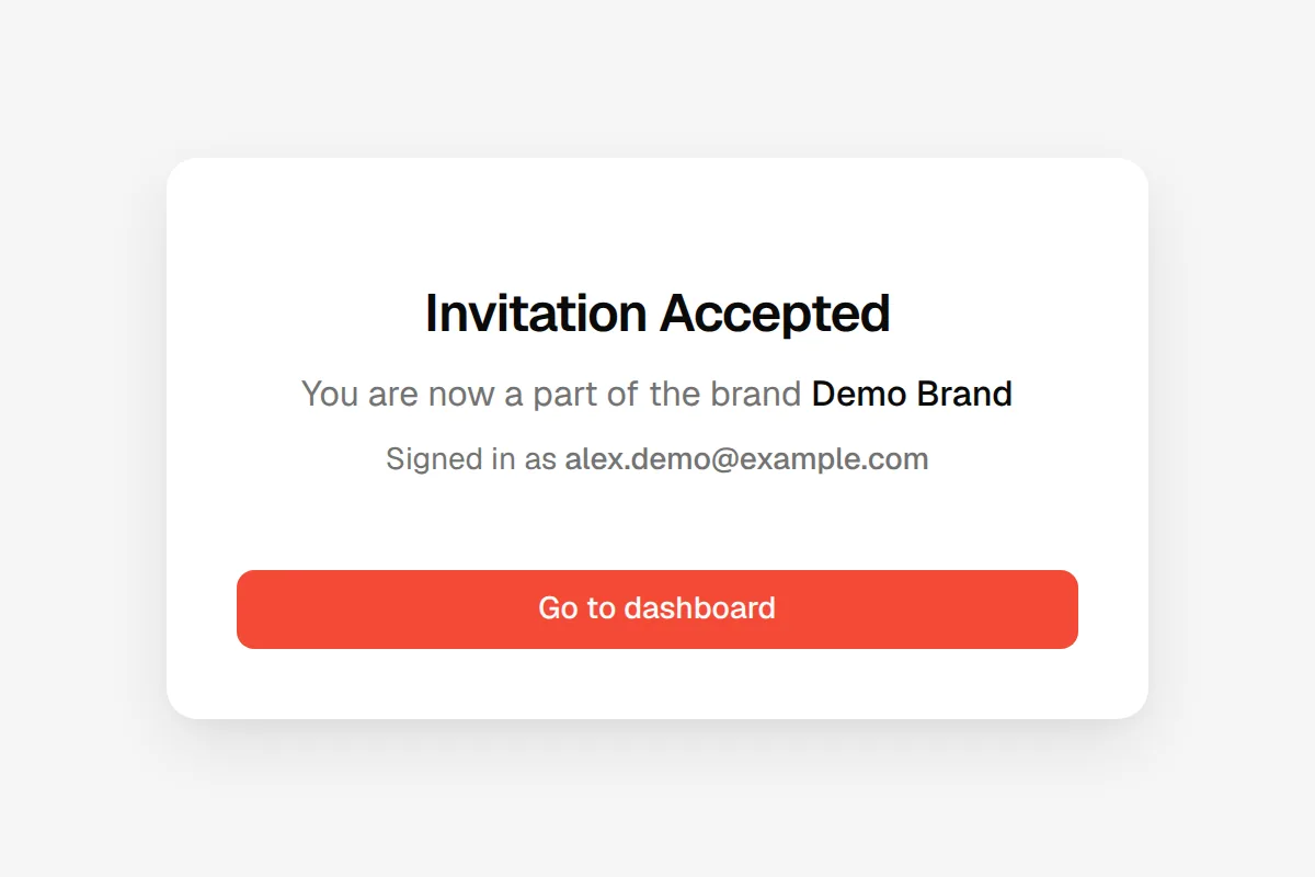 The Invitation Accepted card naming the brand with a Go to dashboard button